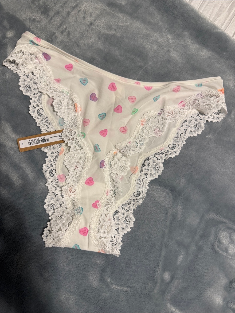 SKIMS White Tanga Panty with Pastel Heart Print and Lace Trim